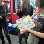 Rosie. Jane, Sharon -Children's Librarian and Jude - Library Manager (spot the hands!) share a tale or two! Photo by Eileen Meara