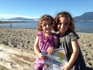 Whoa! Joe with friends - Morgan & Olivia at Spanish Banks beach, overlooking the North Shore Mountains in Vancouver.